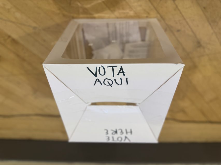 One of the ballot boxes for community members to decide what version of the 1979 Mission St. housing project they want, on Thursday May 8, 2025. Photo by Oscar Palma.