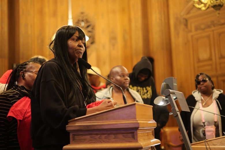 Anona Lee, a tenant at Thomas Paine Square Apartments in the Fillmore, making public comment in front the Board of Supervisors on April 22.