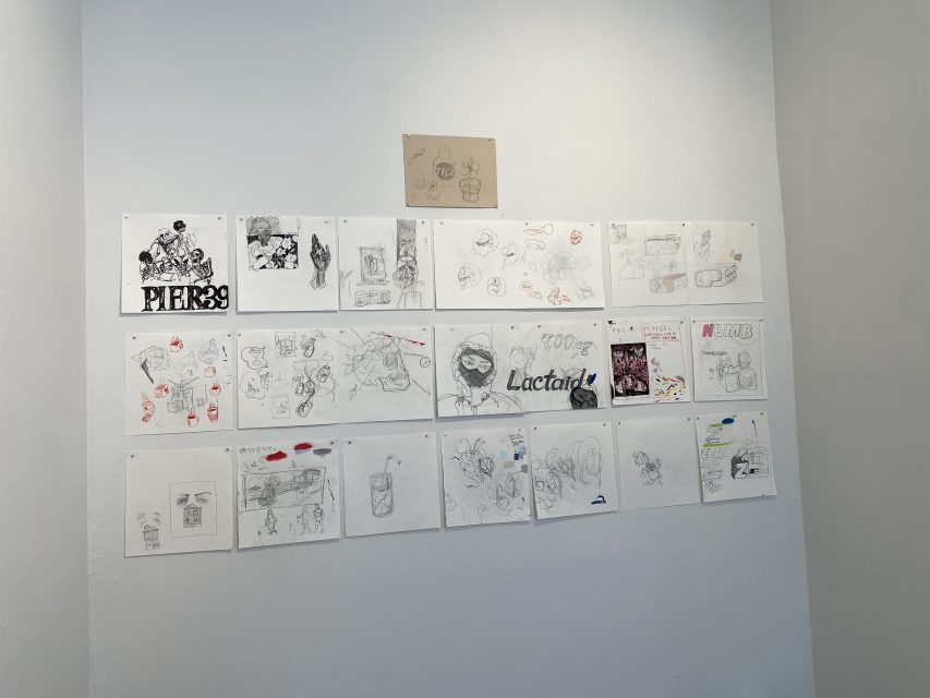 A gallery wall displays 18 sketches and drawings, mostly in pencil, arranged in three rows with one additional drawing centered above the rest.