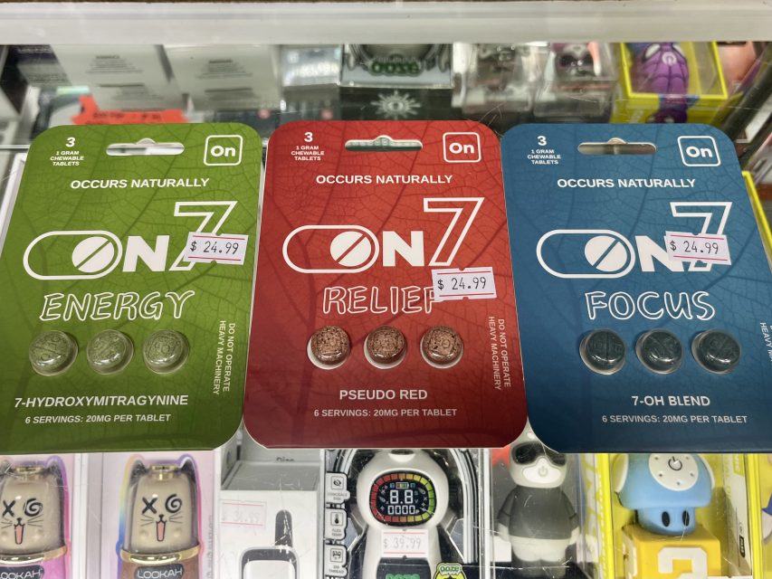 Three different ON7 supplement packs labeled Energy, Relief, and Focus, each containing three tablets, are displayed for sale at $24.99 each.