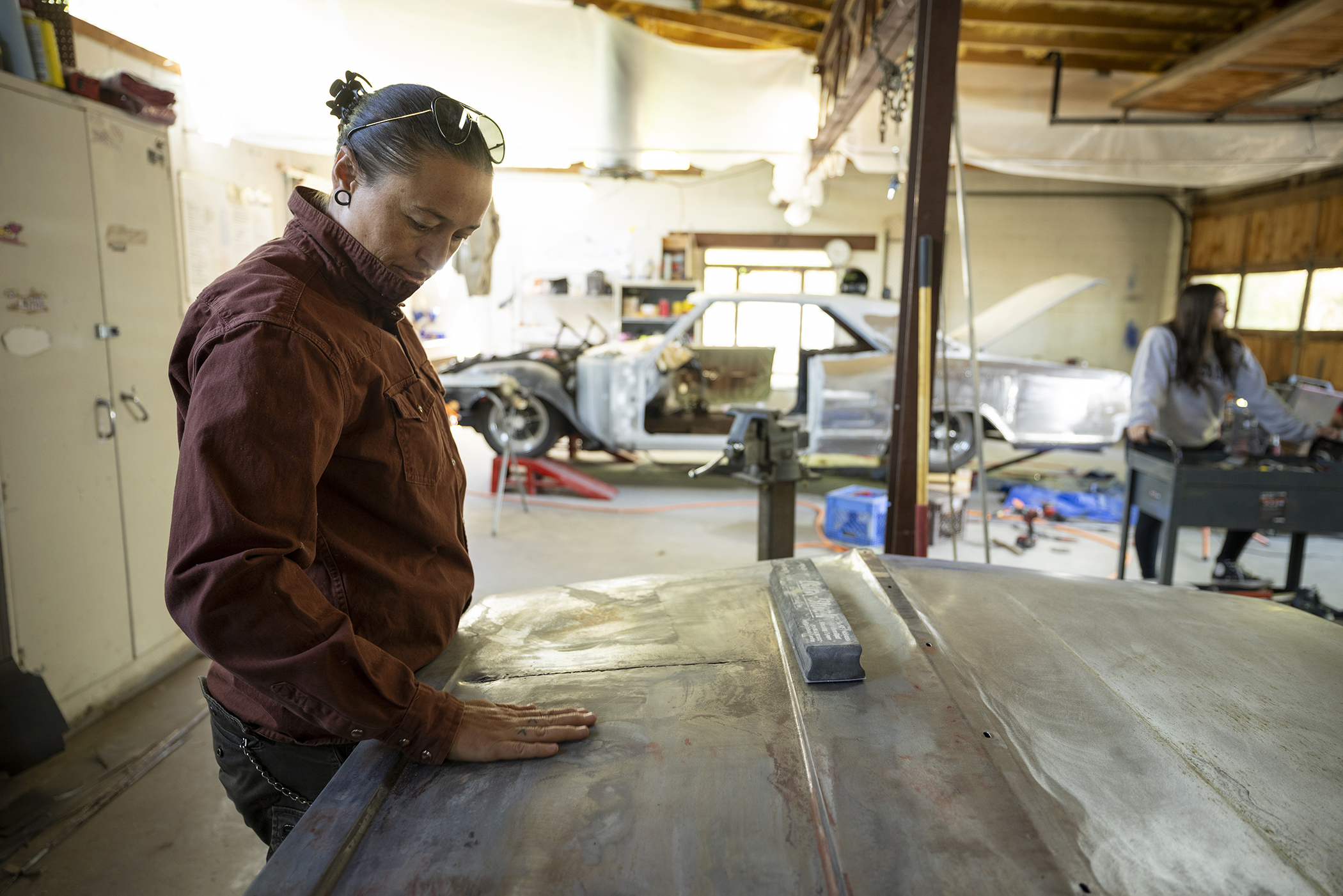 Artist Rose B. Simpson parks a 1964 Buick inside the de Young Museum