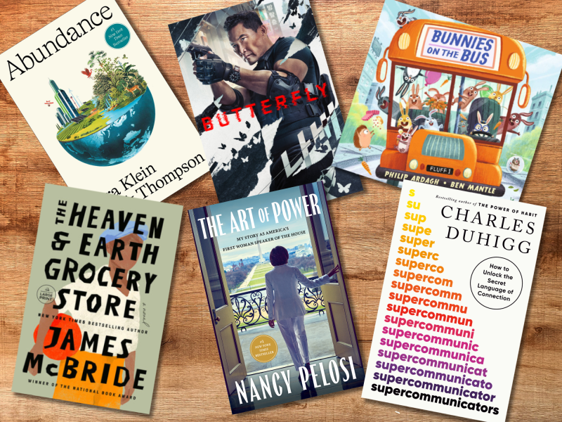 Six book covers arranged on a wooden surface, featuring various genres, including fiction, nonfiction, memoir, and children’s literature.