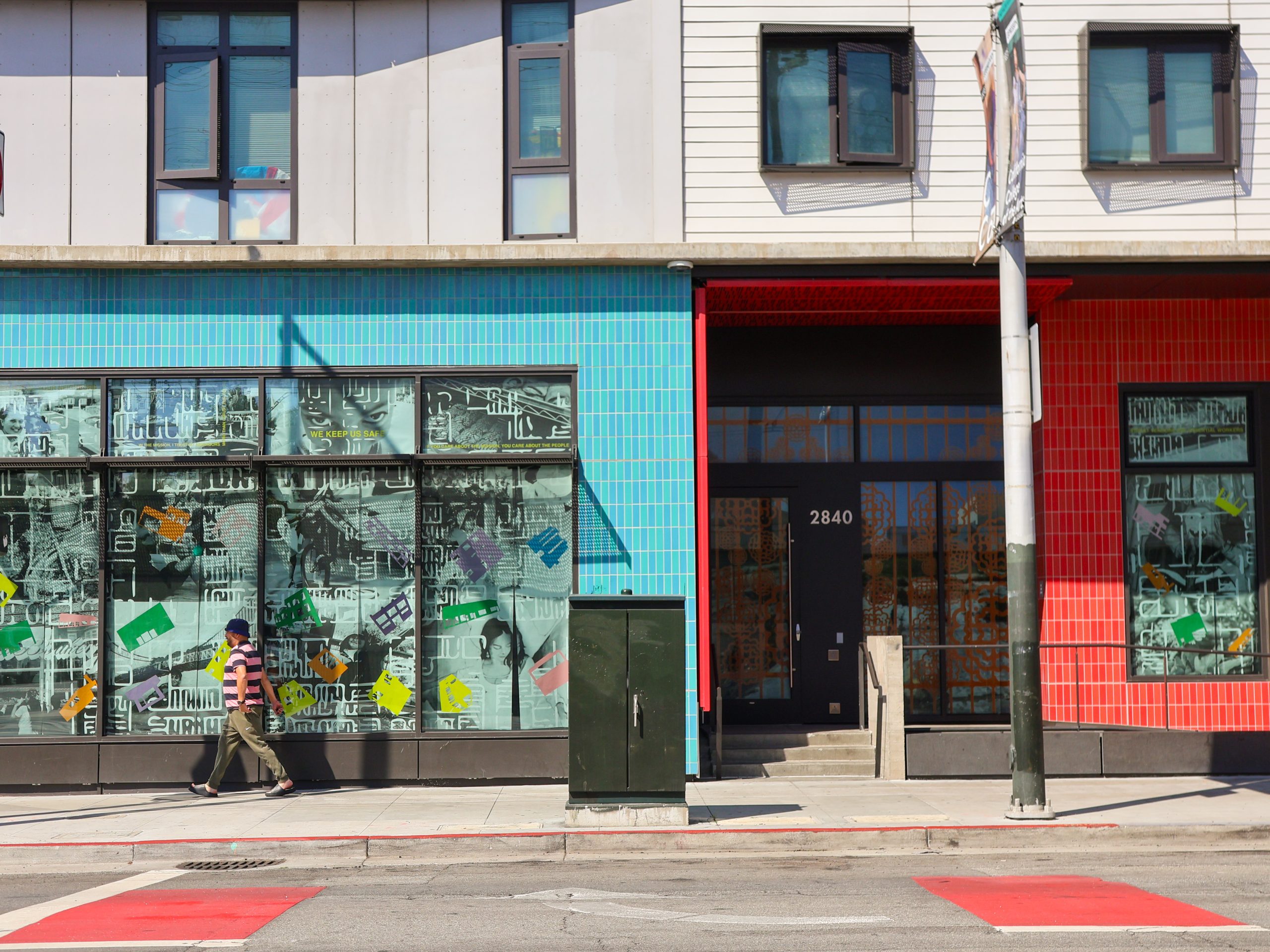 What do Mission District kids see? A new mural showcases childrens' photographs.