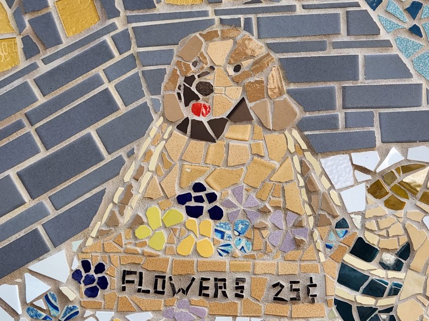 A mosaic of a dog on a beige background with blue and yellow flowers and the text "FLOWERS 255" at the bottom.
