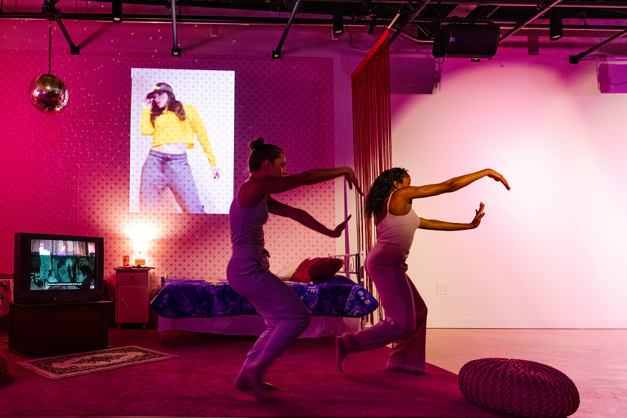 Roombas scattering hot pink glitter take stage at Asian Art Museum