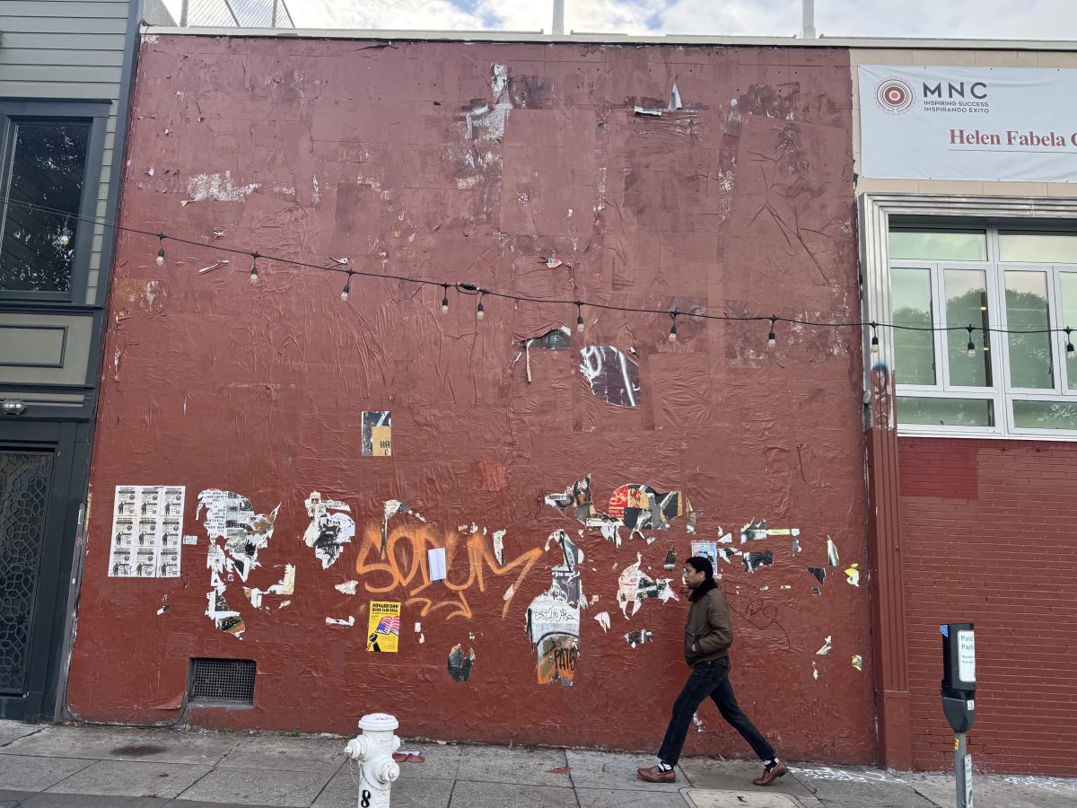 S.F. anti-graffiti workers paint over the Valencia Art Wall
