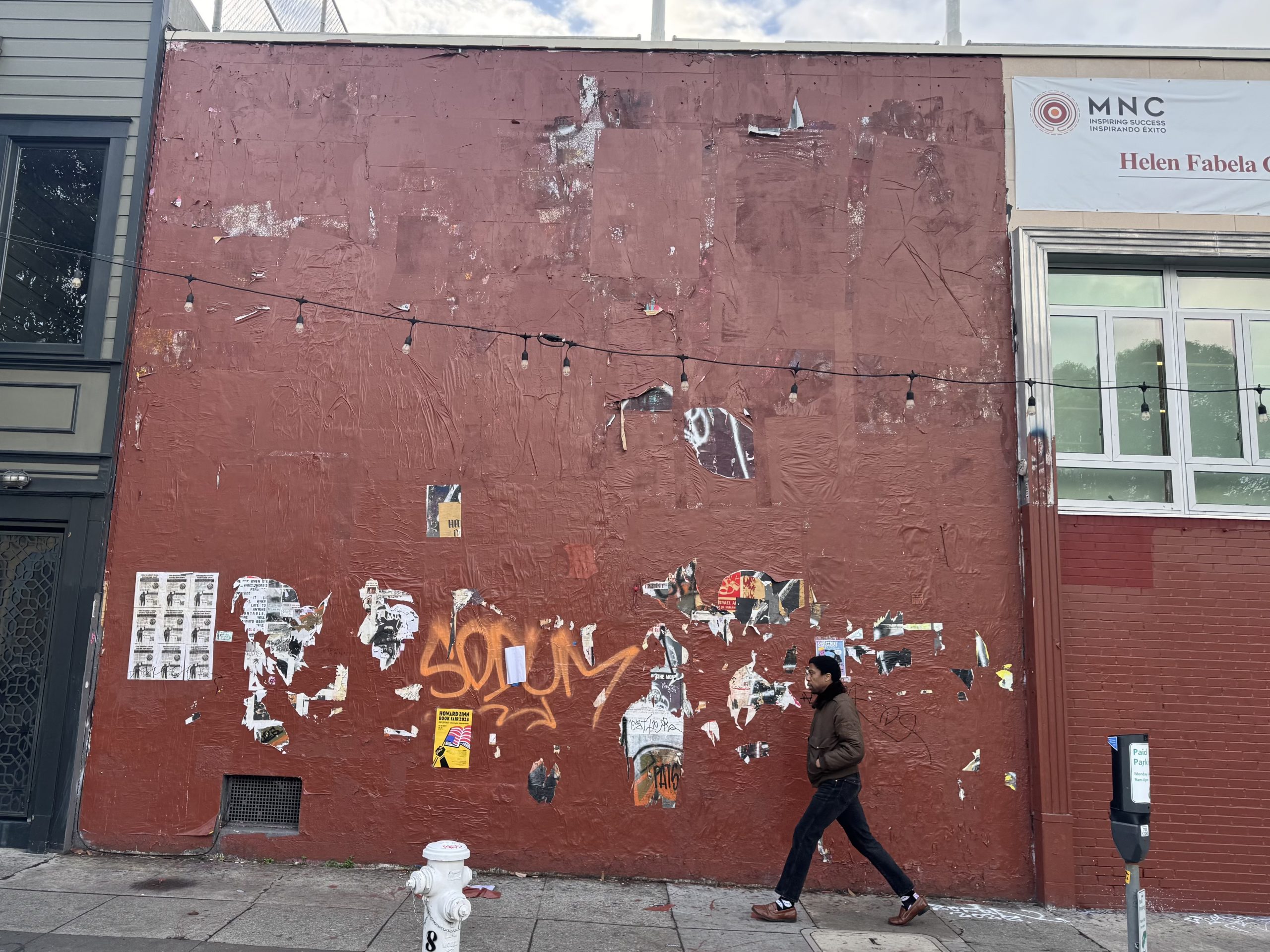 S.F. anti-graffiti workers paint over the Valencia Art Wall