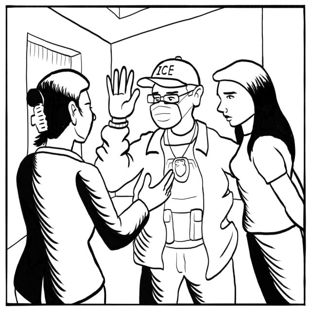 A person wearing an ICE hat and badge raises a hand while talking to two women in a room.