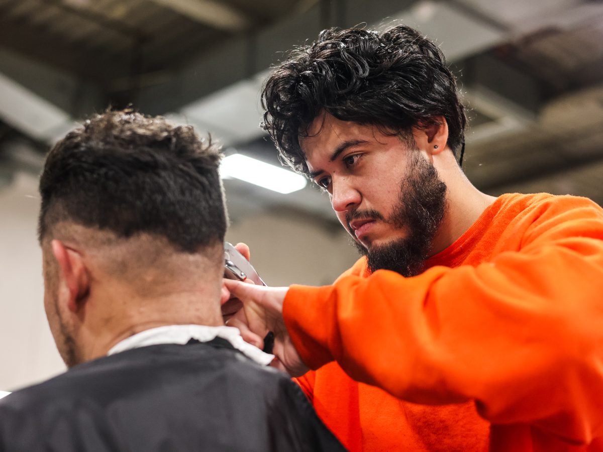 Inside S.F. jail, 13 freshly minted barbers graduate, each with a different hairstyle