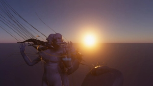 A surreal humanoid figure with multiple arms and wires stands against a vast landscape at sunset.
