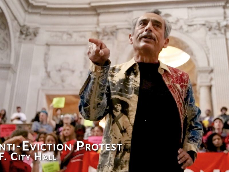 A man pointing at something.