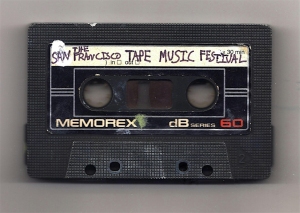 A black Memorex cassette tape with a handwritten label reading "The San Francisco Tape Music Festival.