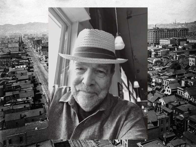 Black and white photo of a smiling older man in a straw hat, overlaid on a vintage cityscape with buildings, streets, and distant hills.