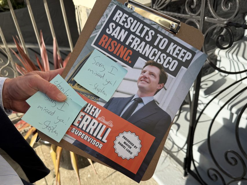 A clipboard with a campaign flyer for Ben Terrill, candidate for San Francisco supervisor, and handwritten sticky notes saying, "Sorry I missed you! - Sophia.