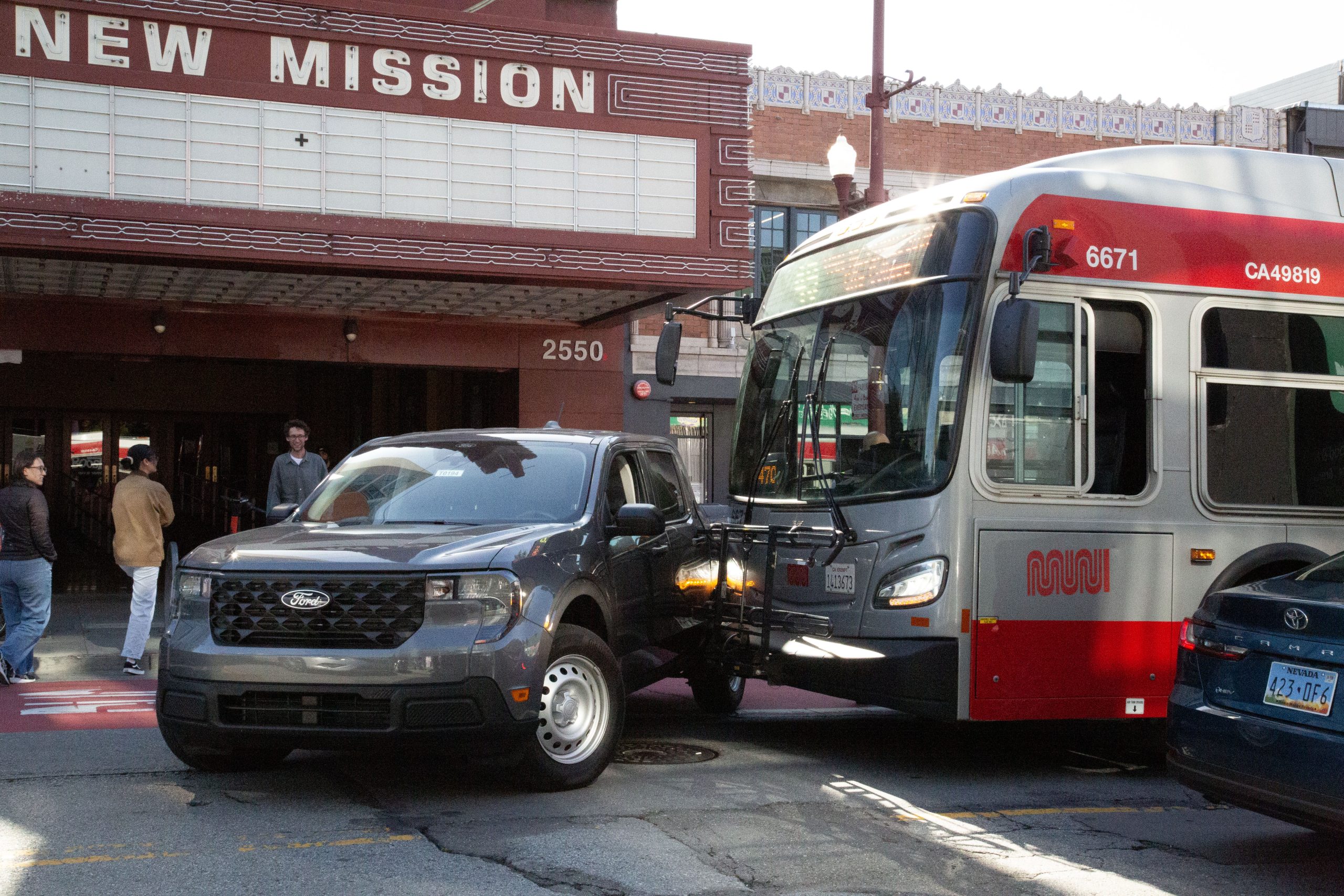 S.F. Muni bus hits truck making illegal U-turn on Mission St., several injured