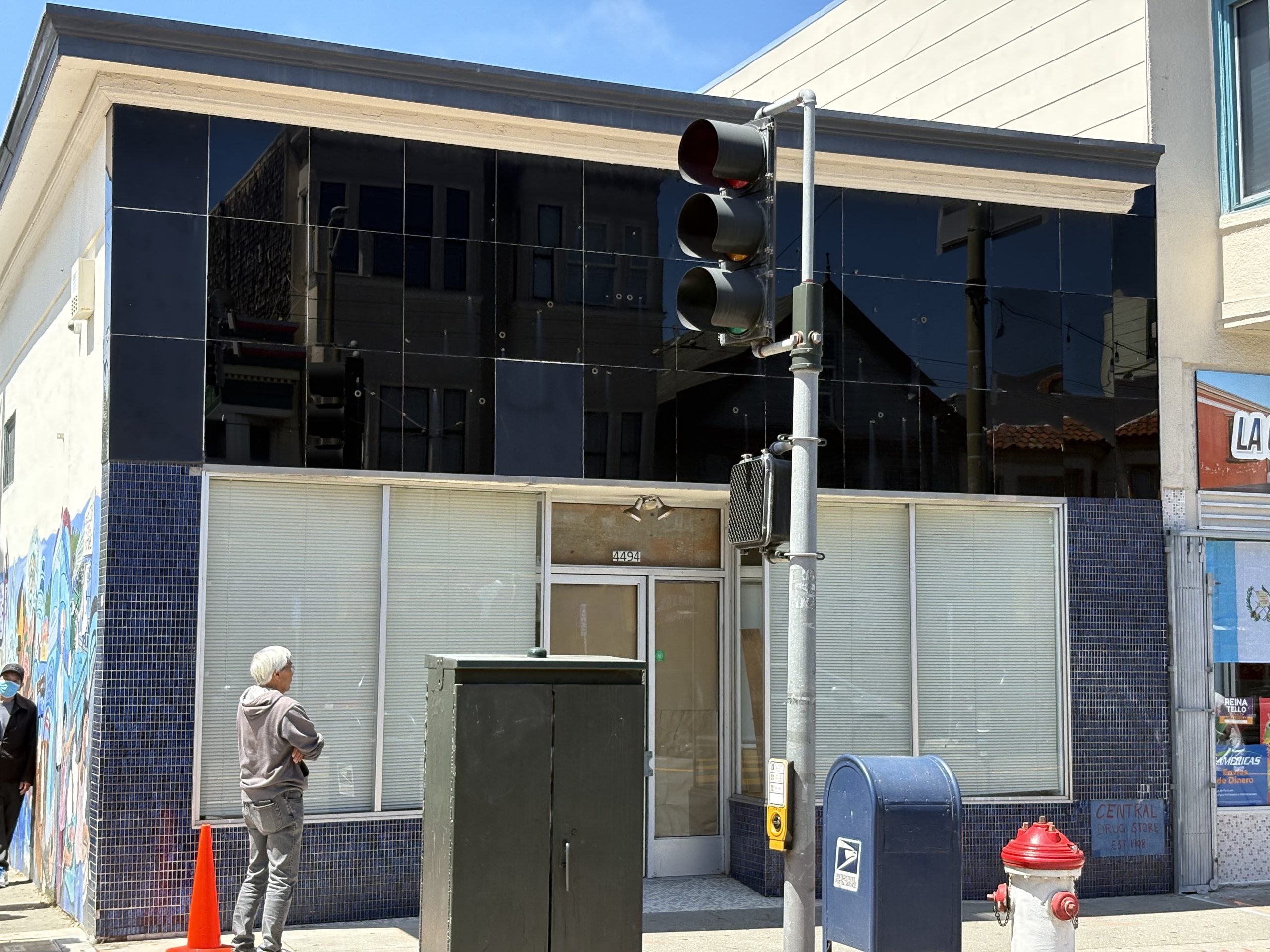 Excelsior's iconic Central Drug Store building sells